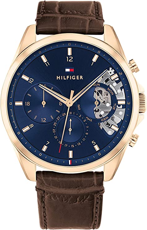 Tommy Hilfiger Montre Analogique Multifunction à Quartz pour Homme avec Bracelet en Cuir Marron foncé - 1710453 2 Tommy Hilfiger Montre Analogique Multifunction à Quartz pour Homme avec Bracelet en Cuir Marron foncé - 1710453